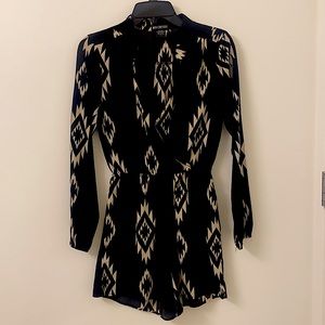 Tilley’s black tribal pattern romper